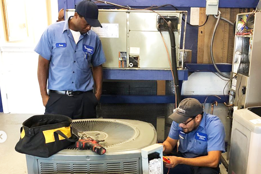 field ready instructor conducting hands on training with hvac unit